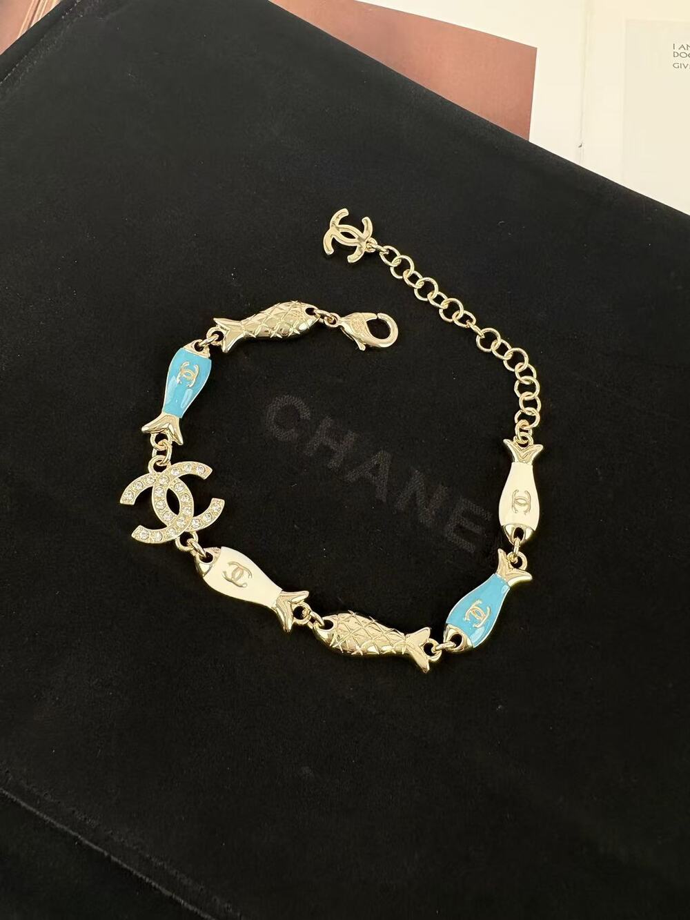 Chanel Gold Tone Bracelet Blue Enamel Fish Charms Interlocking CC Logo